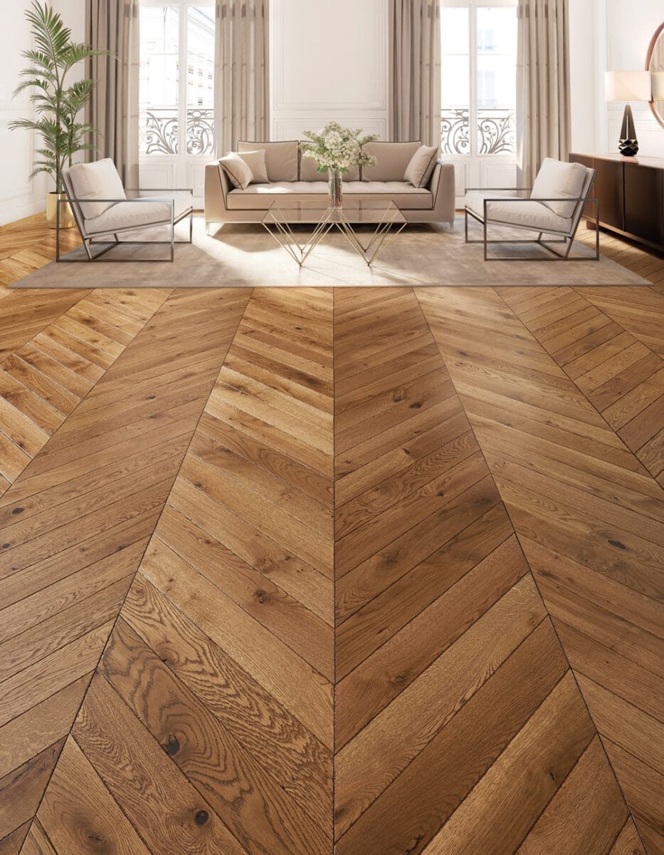 Chevron-pattern hardwood flooring in a living room installed by ARK Renovation