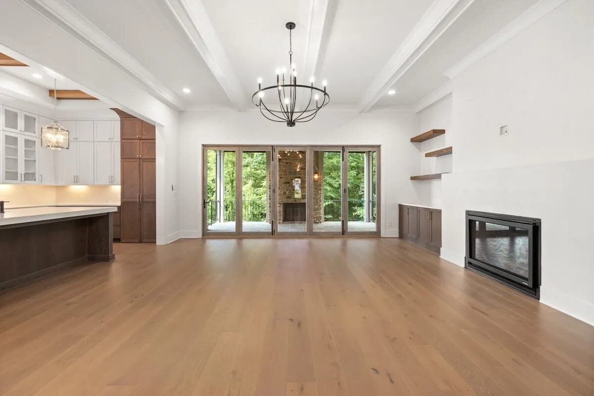Wide-plank hardwood flooring installed in a Toronto great room by ARK Renovation